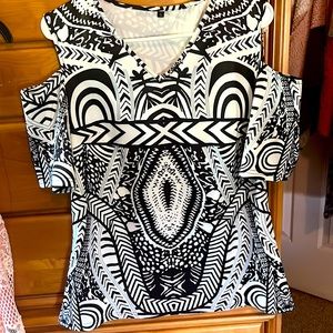 Large, black and white cold, shoulder sleeved blouse